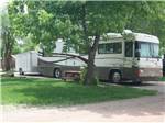 Class A Motorhome parked on-site at LAKE PARK CAMPGROUND & COTTAGES - thumbnail