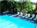 View of the pool and lounge chairs at SANTA ROSA CAMPGROUND - thumbnail