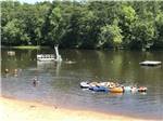 People enjoying recreation in the lake at PARADISE LAKE FAMILY CAMPGROUND - thumbnail