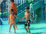 A couple of kids in the waterpark at LAKEWOOD CAMPING RESORT - thumbnail