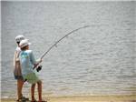 A couple of kids fishing at LAKEWOOD CAMPING RESORT - thumbnail