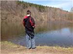 A man fishing at the lake at BEAR RUN CAMPGROUND - thumbnail