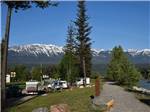 RV sites with snowcapped mountains in the background at GOLDEN MUNICIPAL CAMPGROUND - thumbnail