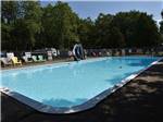 Sparkling pool with slide at SCOTT'S FAMILY RV-PARK CAMPGROUND - thumbnail