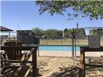 The fenced in swimming pool at FORT STOCKTON RV PARK - thumbnail