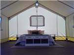 Inside of one of the glamping tents at REDWOOD MEADOWS RV RESORT - thumbnail