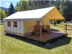 The front porch of the glamping tent at REDWOOD MEADOWS RV RESORT - thumbnail