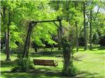 A swinging park bench at SPAULDING LAKE CAMPGROUND - thumbnail