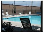 Pool area with lounge chair at PRINCE OF TUCSON RV PARK - thumbnail