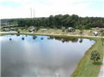 An aerial view of the lake and palm trees at SEVEN SPRINGS TRAVEL PARK - thumbnail