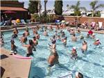 People swimming in the pool at MESA REGAL RV RESORT - thumbnail