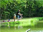 Family fishing at PINCH POND FAMILY CAMPGROUND - thumbnail