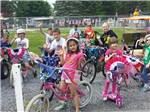 Kids biking at PINCH POND FAMILY CAMPGROUND - thumbnail