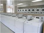 A long line of washing machines at NEWPORT DUNES WATERFRONT RESORT & MARINA - thumbnail