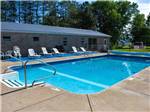 The swimming pool with lounge chairs at CHERRY GROVE CAMPGROUND - thumbnail