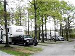 Two fifth wheel trailers backed in at RV spaces at BEAN POT CAMPGROUND - thumbnail