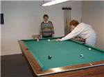Women playing pool at WEAVER'S NEEDLE RV RESORT - thumbnail