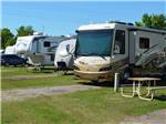 RVs and trailers at campground at COUNCIL ROAD RV PARK - thumbnail