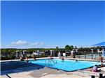 Families enjoying the swimming pool at QUINTE'S ISLE CAMPARK - thumbnail