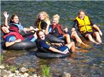 Women floating on inner tubes at KING PHILLIPS CAMPGROUND - thumbnail