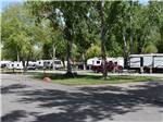 A row of travel trailers in RV sites at LAKESIDE RV CAMPGROUND - thumbnail