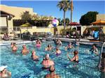 Volleyball in pool at SUNFLOWER RV RESORT - thumbnail