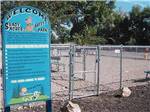 Large fenced play area for pets at SHADY ACRES RV PARK - thumbnail