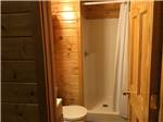 Interior of cabin toilet and shower at OASIS CAMPGROUND - thumbnail