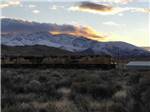 A train going by nearby at MOUNTAIN SHADOWS RV PARK - thumbnail