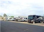 RVs and trailers at campground at VILLA ALAMEDA RV RESORT - thumbnail