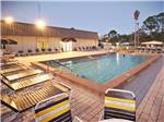 Swimming pool with outdoor seating at ENCORE SOUTHERN PALMS - thumbnail