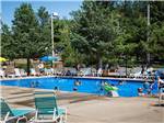 People swimming in the pool at ARROWHEAD RV CAMPGROUND - thumbnail