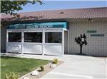 The front entrance building at DESERT WILLOW RV RESORT - thumbnail