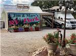 A motorhome by the office at JIM & MARY'S RV PARK - thumbnail