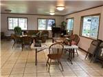 Tables and chairs in the office at JIM & MARY'S RV PARK - thumbnail