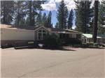 A large building with trees at COACHLAND RV RESORT / VILLAGE CAMP TRUCKEE - thumbnail