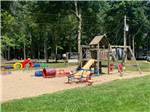Wooden play structure with slide at CAMP LAKEWOOD CAMPGROUND - thumbnail