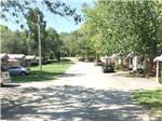 The road between manufactured homes at COOPER CREEK RESORT & CAMPGROUND - thumbnail