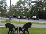 A sitting area next to an RV site at TALLAHASSEE RV PARK - thumbnail
