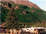 RVs parked near majestic mountains at MOUNTAIN VIEW RV PARK - thumbnail