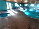 An indoor swimming pool and hot tub at LITTLE VINEYARD RV RESORT - thumbnail