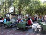 Guests dining in large outdoor area at J & H RV PARK - thumbnail