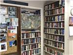 Small library with books for guests at J & H RV PARK - thumbnail