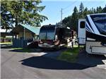 A couple of paved pull thru RV sites at ISSAQUAH VILLAGE RV PARK - thumbnail