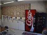 Inside of the laundry room with vending machines at ISSAQUAH VILLAGE RV PARK - thumbnail