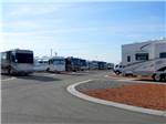 A paved road between RV sites at AMERICAN RV RESORT - thumbnail