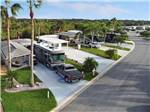 A row of paved deluxe RV sites at THE GREAT OUTDOORS RV NATURE & GOLF RESORT - thumbnail