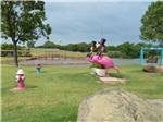 Large flamingo statues at WICHITA FALLS RV PARK - thumbnail