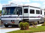 A motorhome parked on-site at CASA DEL VALLE RV RESORT - thumbnail