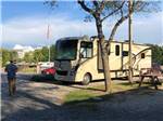 Class A Motorhome parked on-site at MEMPHIS GRACELAND RV PARK & CAMPGROUND - thumbnail